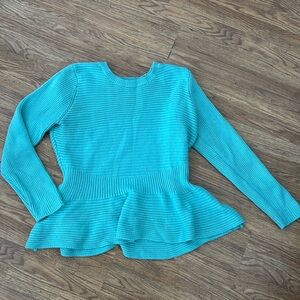 Women’s peplum sweater